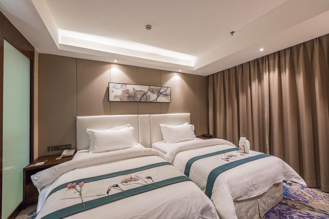Metropolo Jinjiang Xuzhou Railway Station Suning Plaza Chudu Hotel Exterior photo